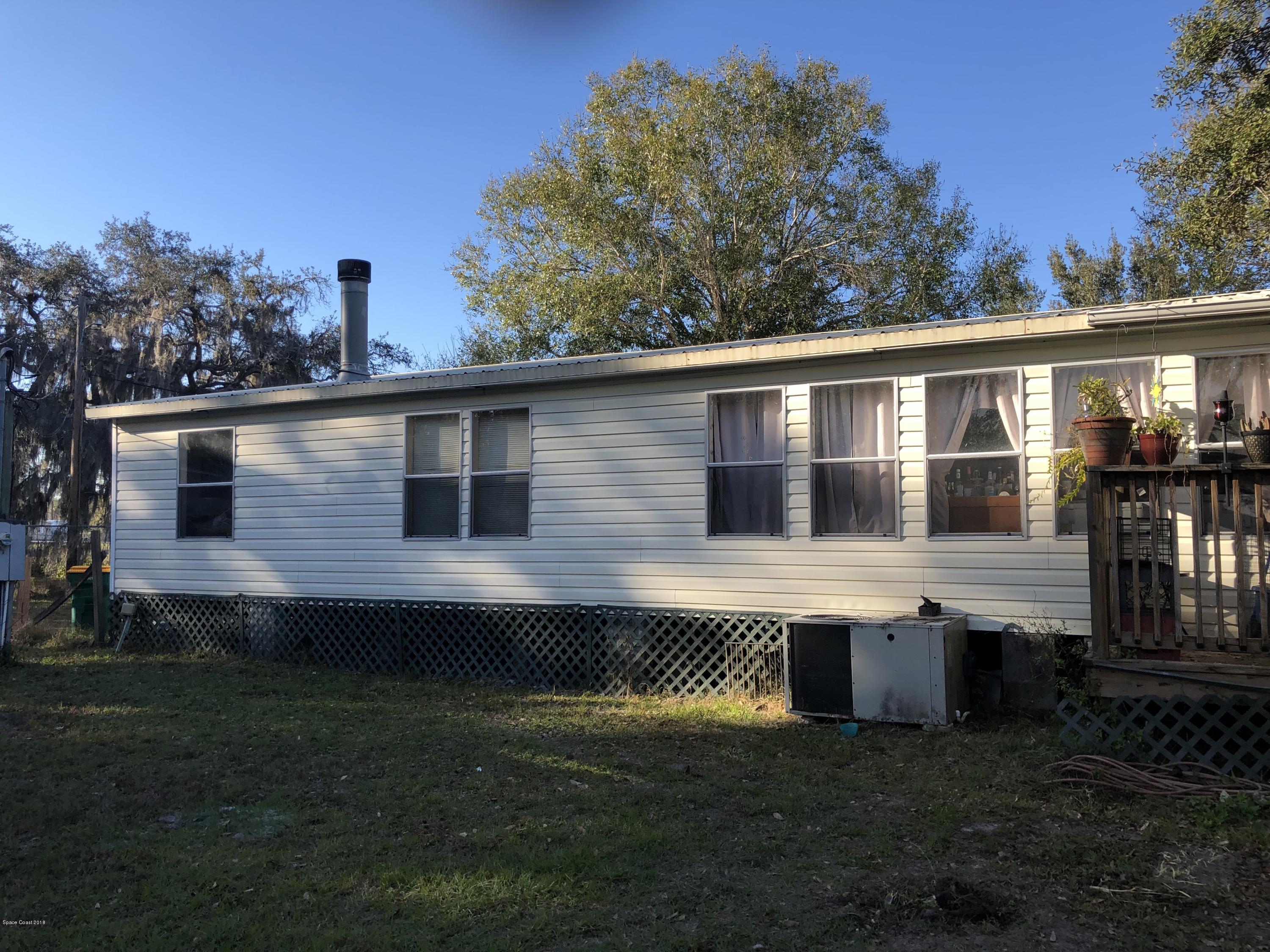 4795 Harrison Road Mims, FL 32754 - Photo 17 of 19 Back of Double Wide