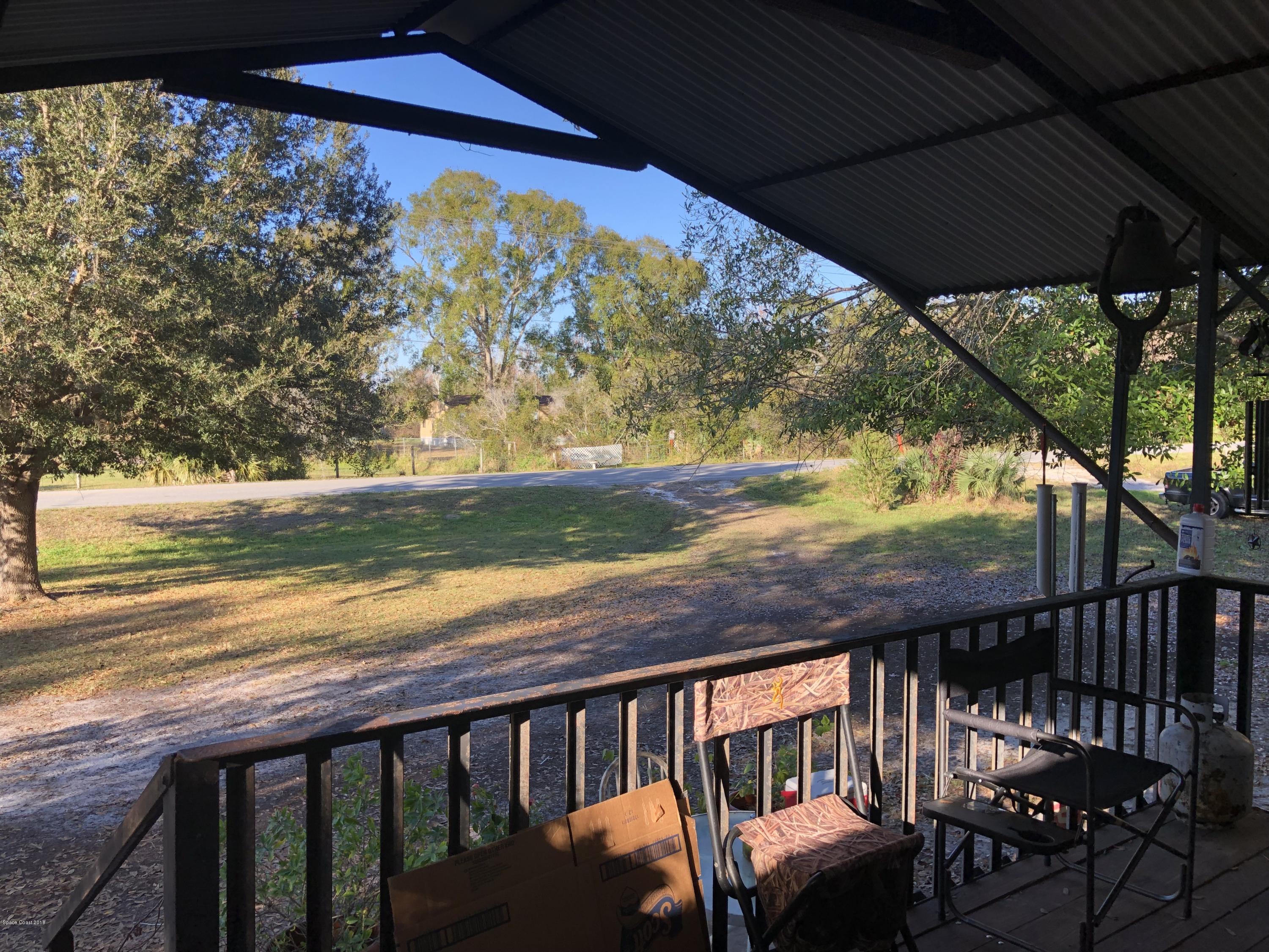 4795 Harrison Road Mims, FL 32754 - Photo 10 of 19 Front Wooden Deck