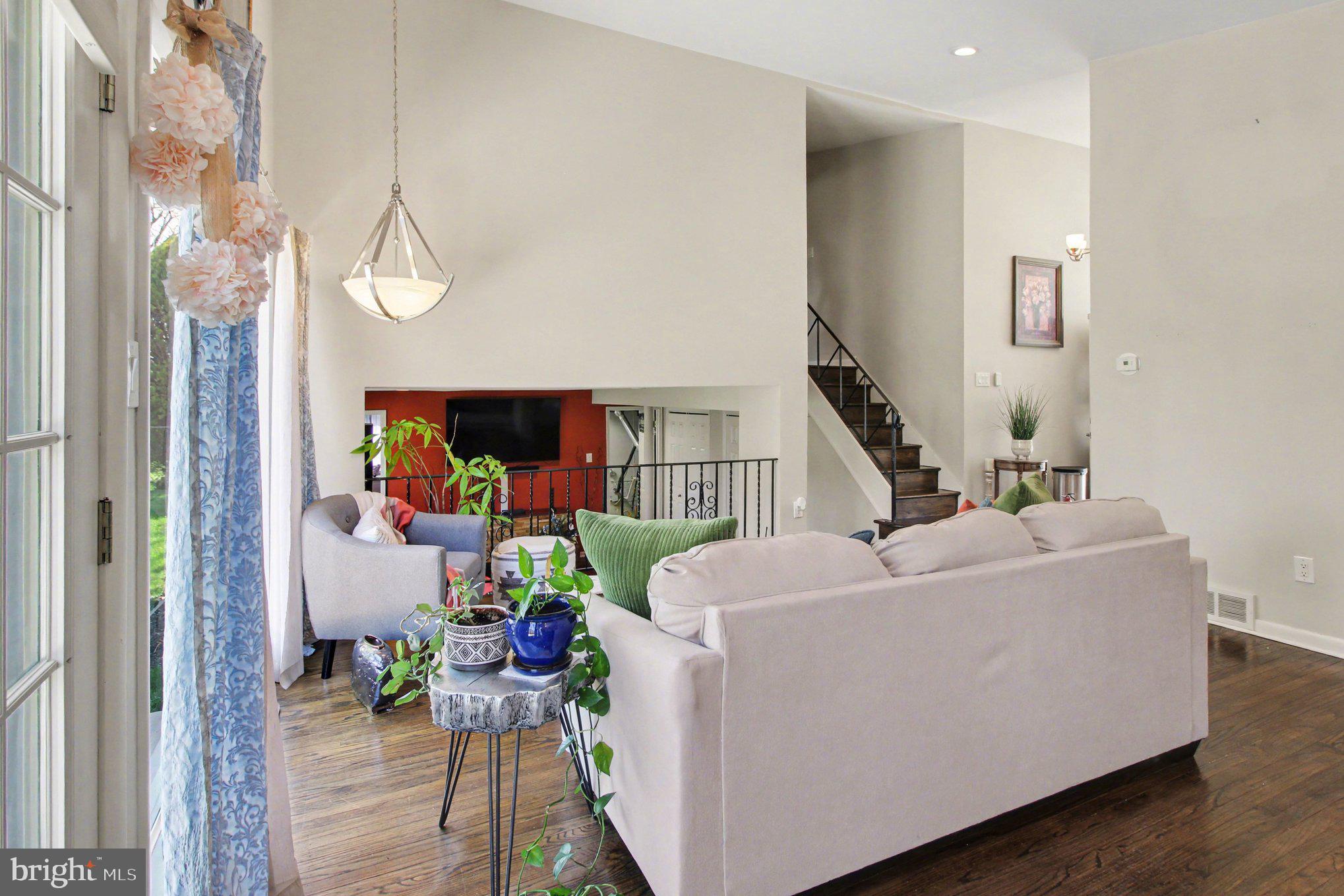 908 Fraser Road Glenside, PA 19038 - Photo 11 of 36 a living room with furniture and a flat screen tv