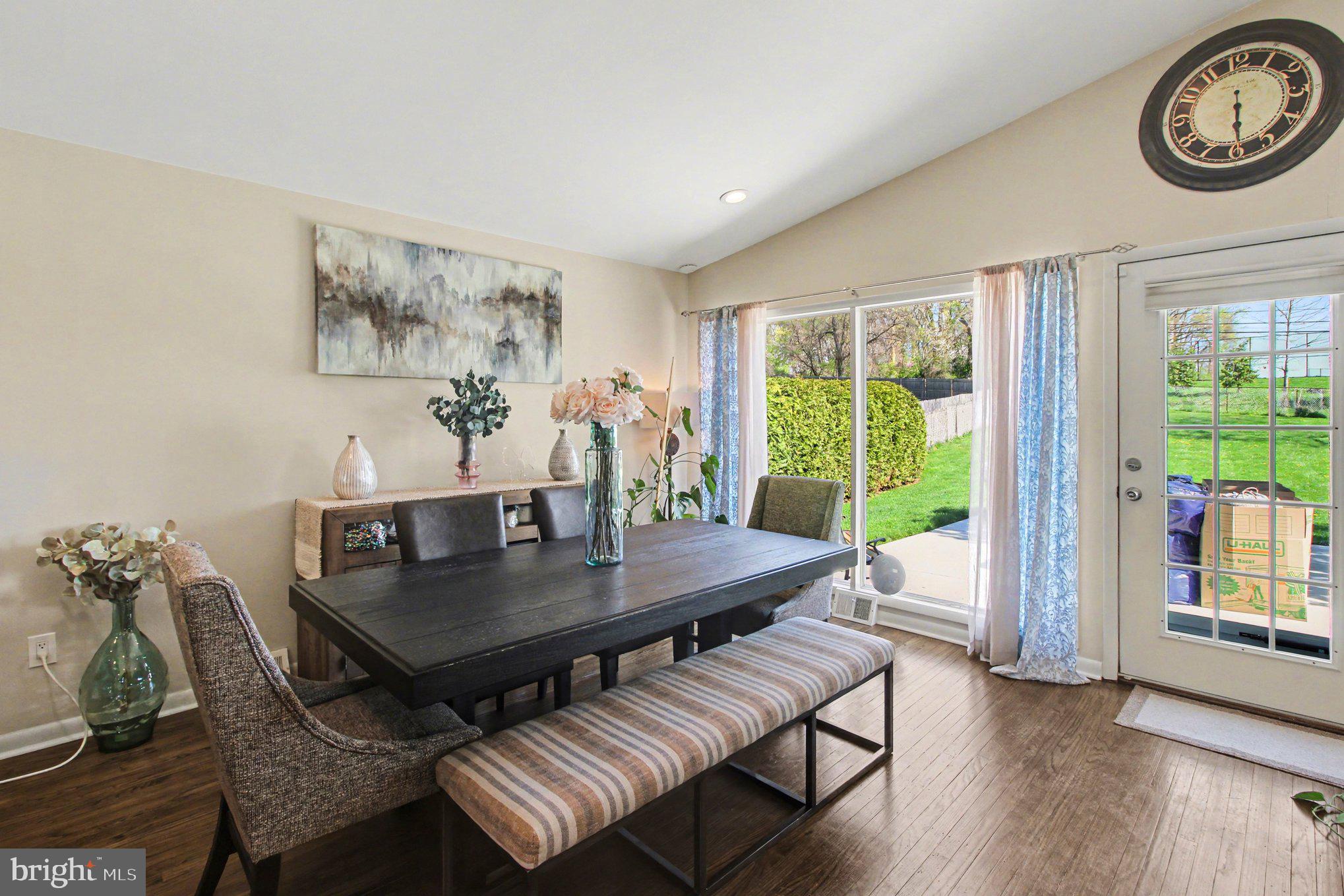 908 Fraser Road Glenside, PA 19038 - Photo 12 of 36 a view of a dining room with furniture window and wooden floor