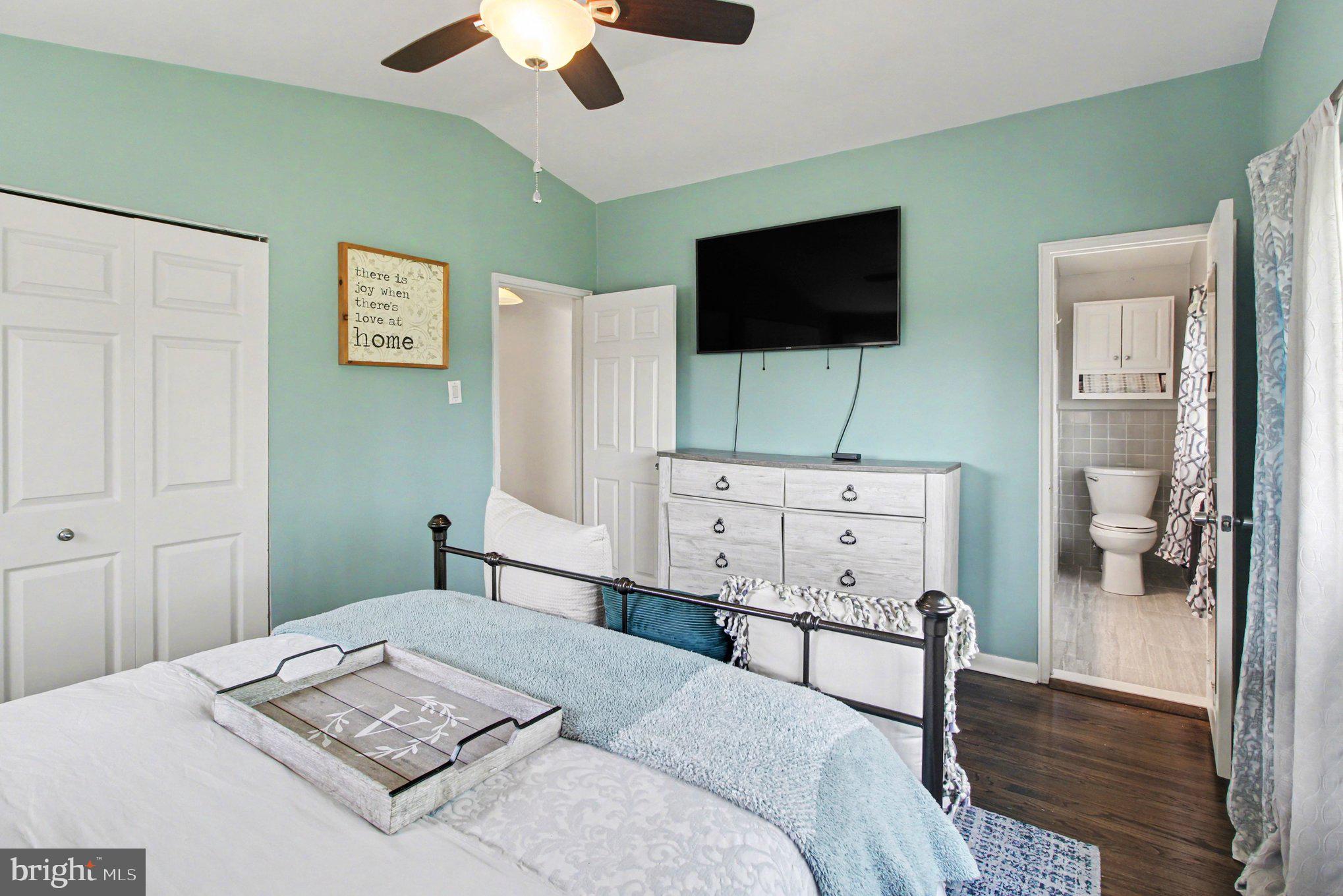 908 Fraser Road Glenside, PA 19038 - Photo 17 of 36 a bedroom with a bed and a flat screen tv