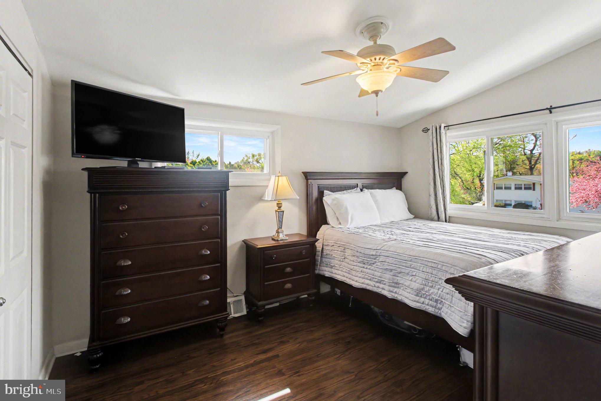 908 Fraser Road Glenside, PA 19038 - Photo 19 of 36 a bedroom with a bed and a flat screen tv
