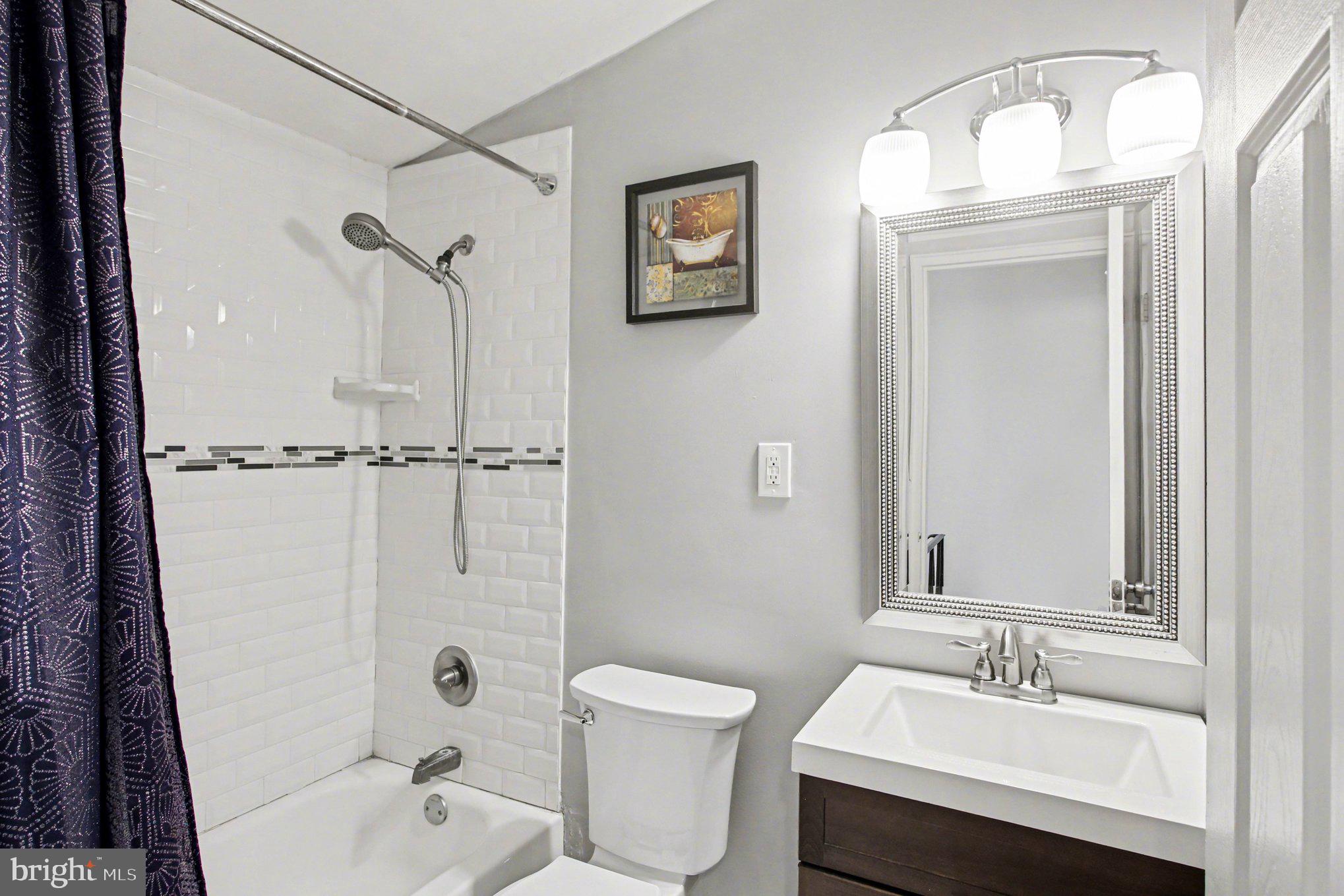 908 Fraser Road Glenside, PA 19038 - Photo 23 of 36 a bathroom with a sink a toilet and shower