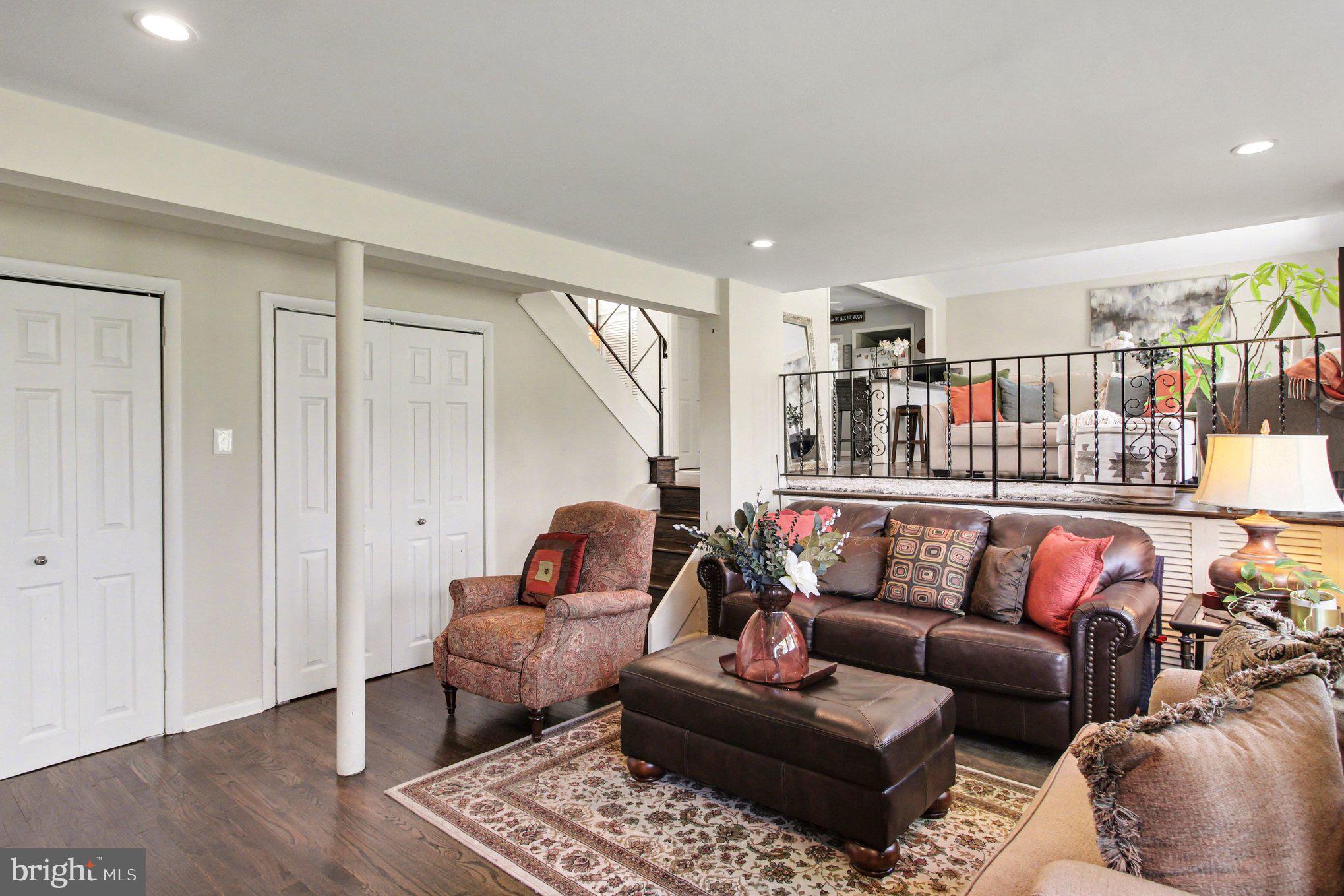 908 Fraser Road Glenside, PA 19038 - Photo 24 of 36 a living room with furniture and wooden floor