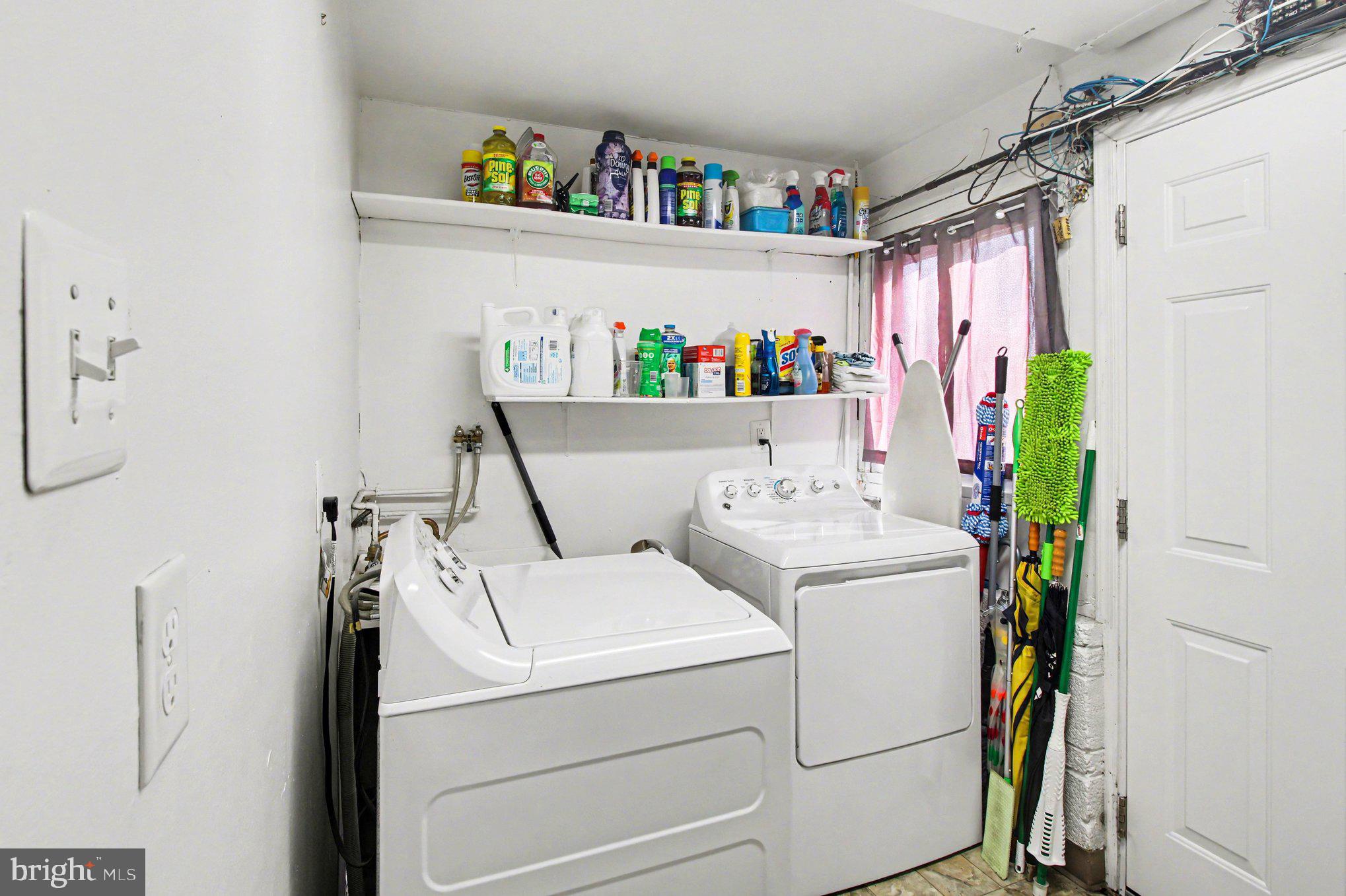 908 Fraser Road Glenside, PA 19038 - Photo 27 of 36 a utility room with dryer and washer