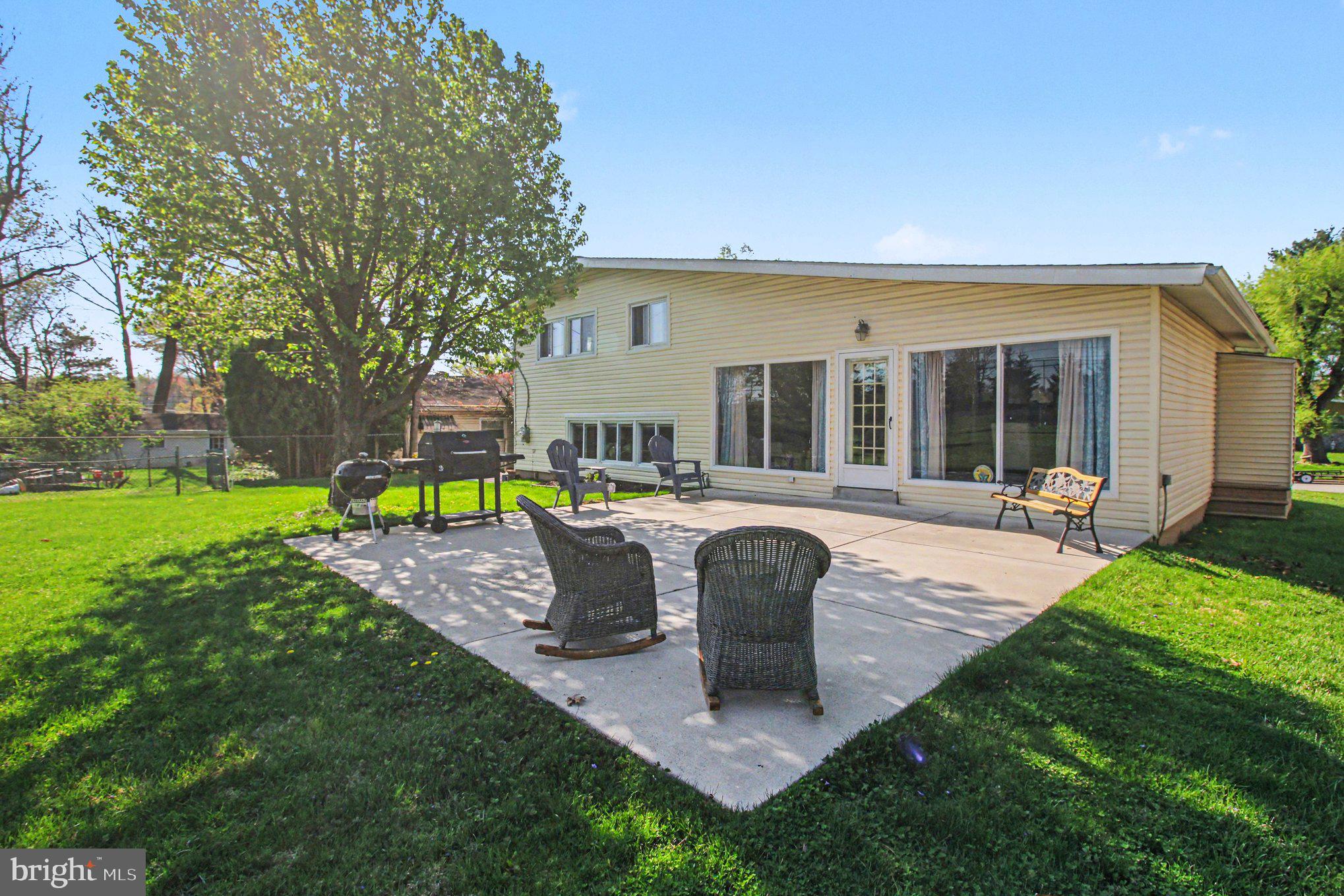 908 Fraser Road Glenside, PA 19038 - Photo 29 of 36 a view of a house with backyard and sitting area