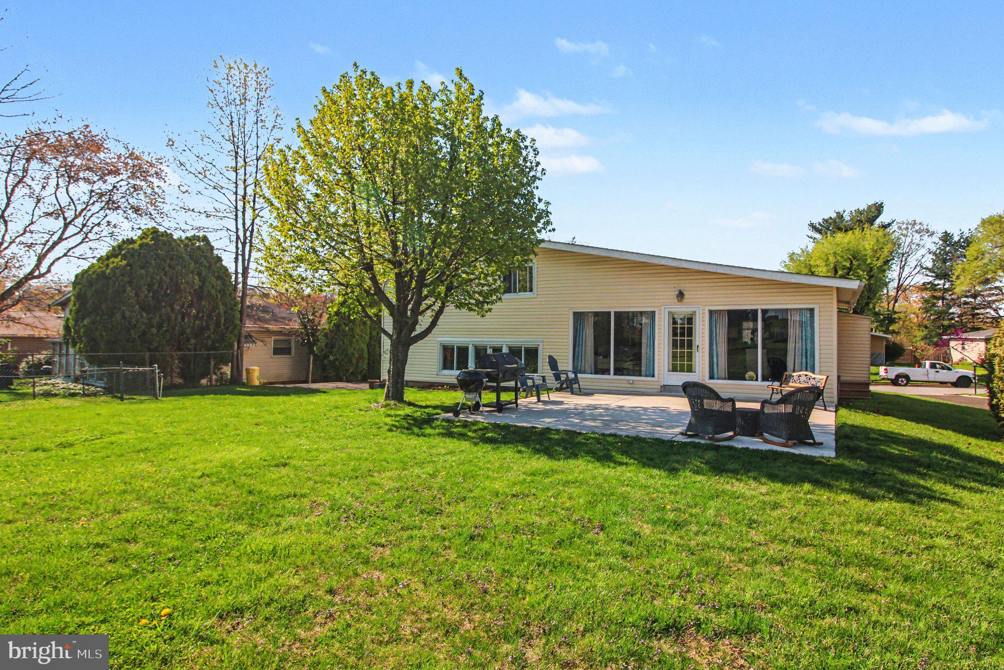 908 Fraser Road Glenside, PA 19038 - Photo 30 of 36 a view of a house with backyard and sitting area
