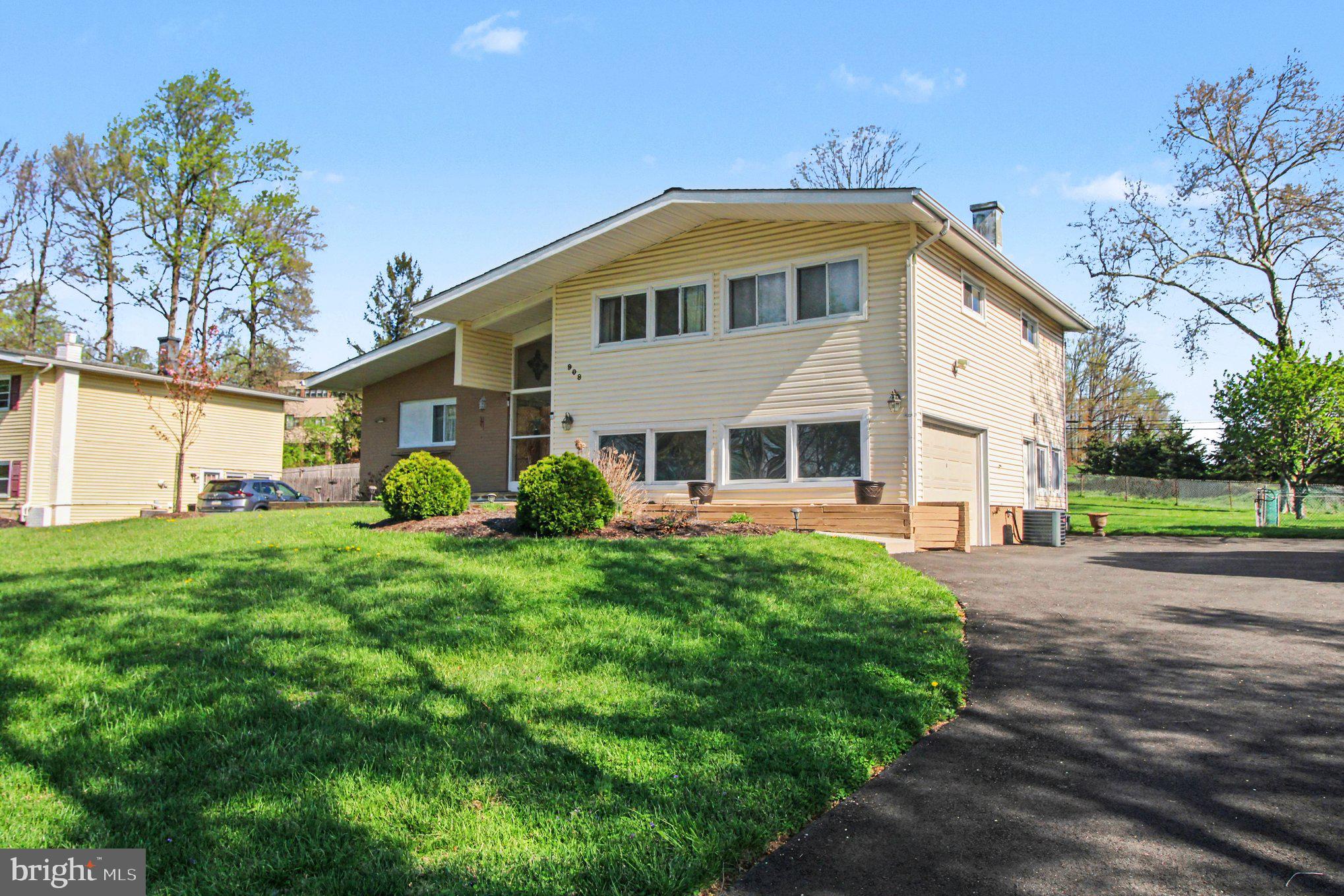 908 Fraser Road Glenside, PA 19038 - Photo 4 of 36 a front view of a house with garden