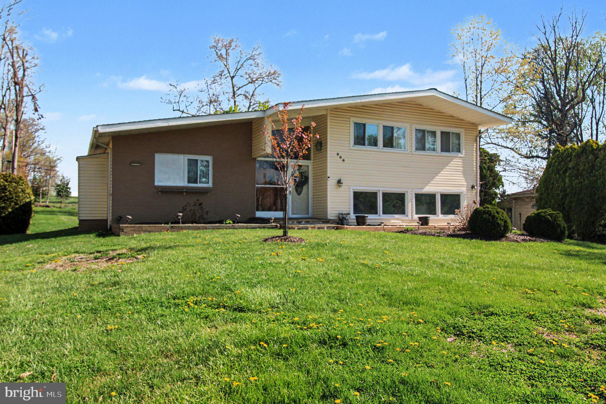 908 Fraser Road Glenside, PA 19038 - Photo 5 of 36 a front view of a house with a yard