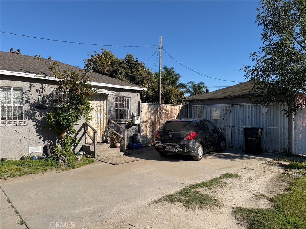 804 East Oaks Street Compton, CA 90221 - Photo 5 of 9 a view of a car park in front of house