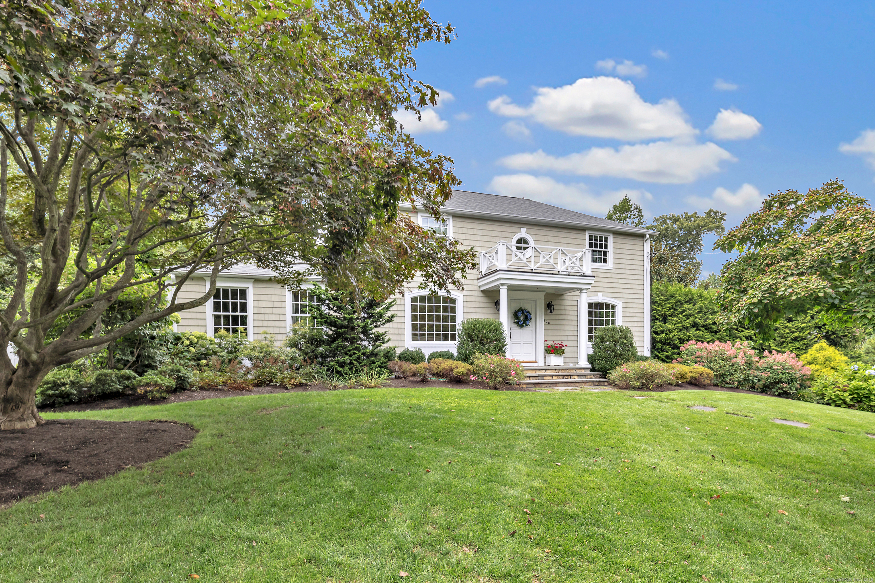 120 Parkwood Road Fairfield, CT 06824 - Photo 1 of 1 a front view of house with yard and green space
