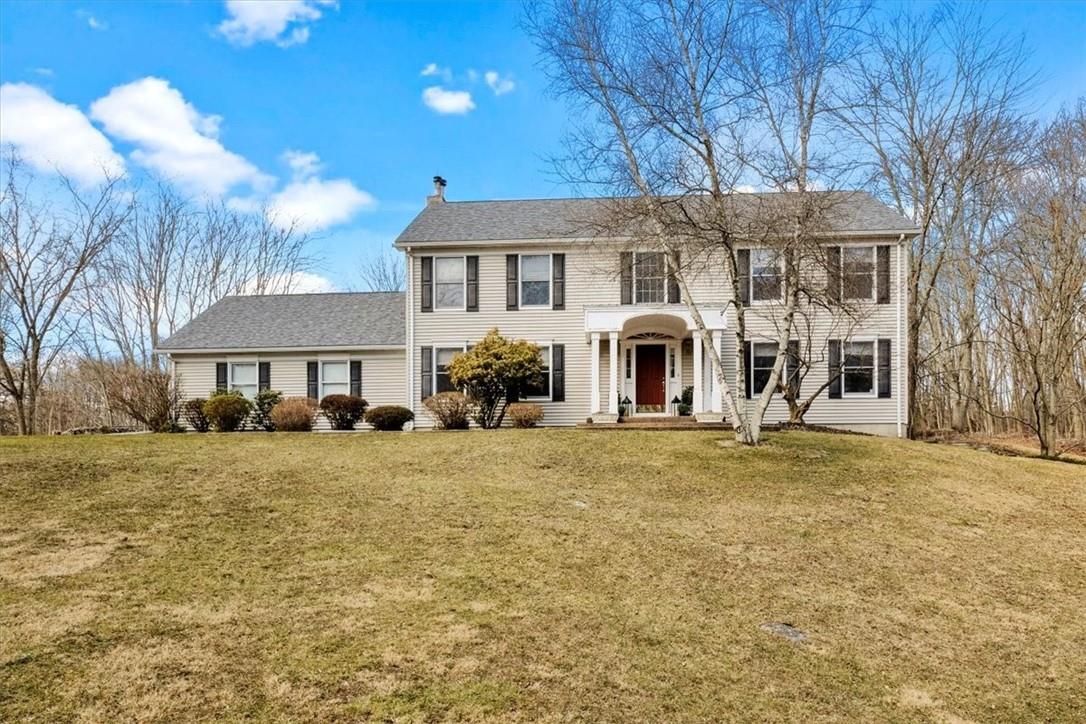 103 Hufcut Road Middletown, NY 10941 - Photo 1 of 1 a front view of a house with a yard and garage