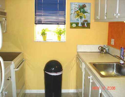 450 Southwest 2nd Avenue, Unit 208A Boca Raton, FL 33432 - Photo 2 of 10 a bathroom with a sink and a tub
