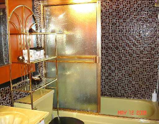 450 Southwest 2nd Avenue, Unit 208A Boca Raton, FL 33432 - Photo 4 of 10 a bathroom with a bathtub