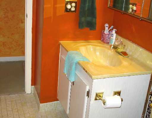 450 Southwest 2nd Avenue, Unit 208A Boca Raton, FL 33432 - Photo 9 of 10 a bathroom with a tub and sink