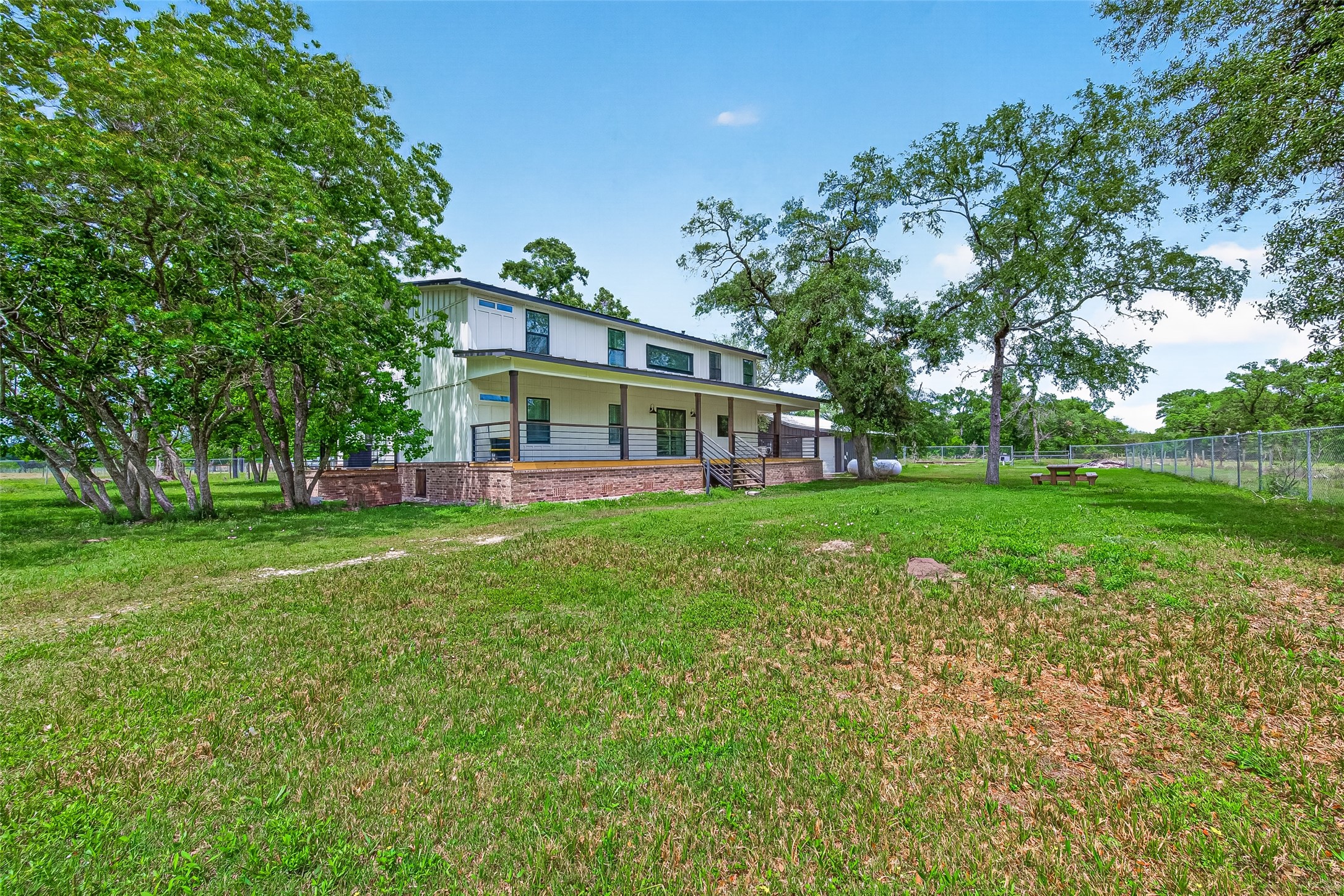 803 County Road 772 Damon, TX 77430 - Photo 37 of 50 a view of a house with a big yard