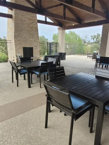 a view of a outdoor seating area with furniture