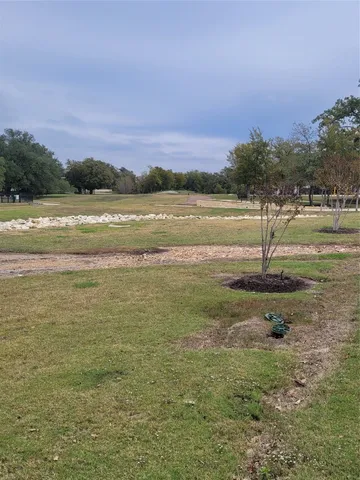 a view of lake with mountain in the background