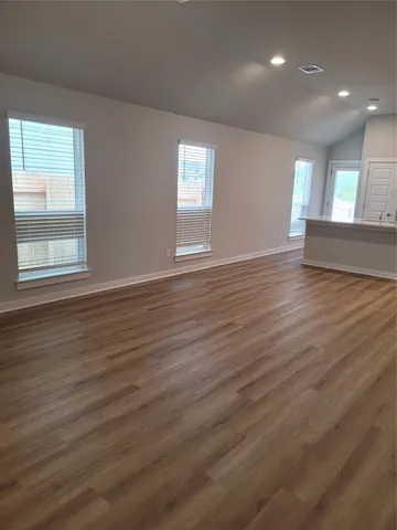 a view of small space with wooden floor