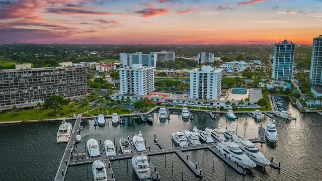 a view of a lake with tall building