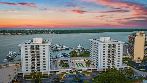 a picture of a house with outdoor seating