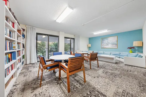 a view of a balcony with wooden floor and staircase