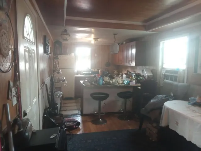 a living room with a fireplace