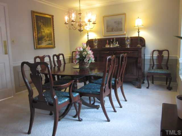 6708 Colony Court Raleigh, NC 27613 - Photo 12 of 25 Need more space for entertaining your guests? Formal dining room features new carpet, new paint, crown & chair rail molding! Dining Room