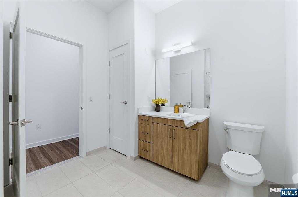 37 Orange Road, Unit 206 Montclair, NJ 07042 - Photo 9 of 16 a bathroom with a sink toilet and shower