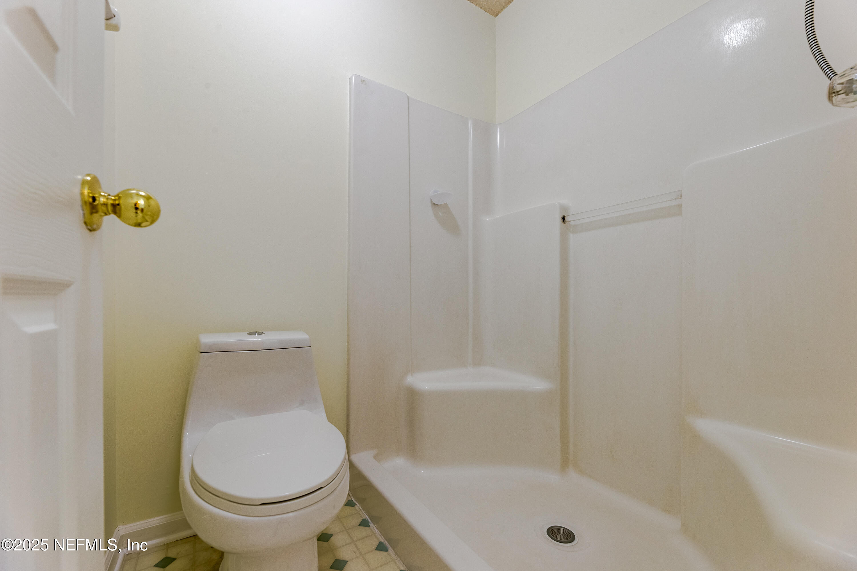 120 Clapton Way Jacksonville, FL 32220 - Photo 30 of 33 a bathroom with a toilet and a shower