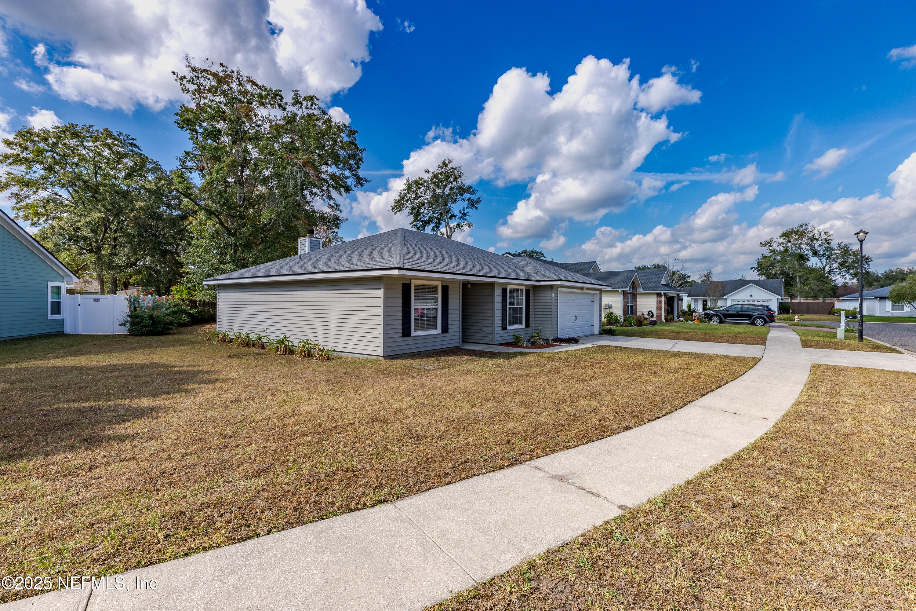 120 Clapton Way Jacksonville, FL 32220 - Photo 4 of 33 a view of a house with a yard
