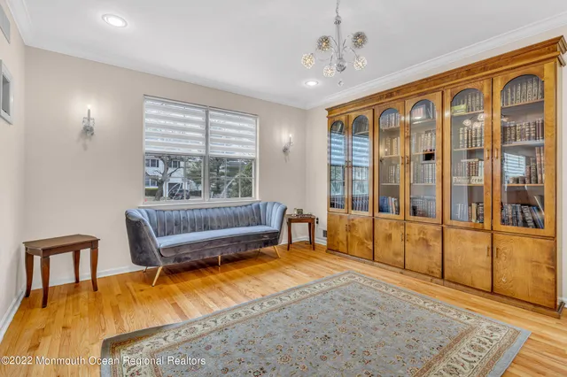 a bathroom with a granite countertop sink toilet and a mirror
