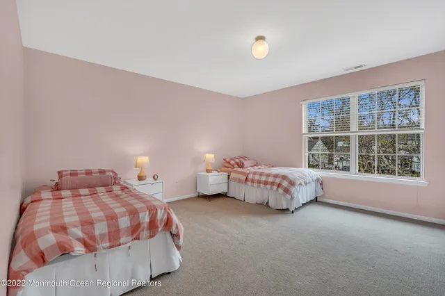 a kitchen with stainless steel appliances granite countertop a sink a stove a refrigerator and cabinets