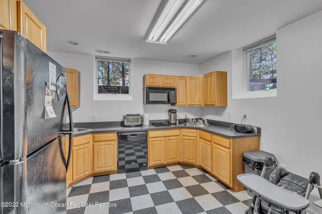 a bedroom with a bed and a table in it