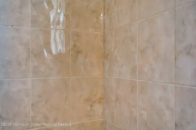 a view of a two chairs and table in the balcony