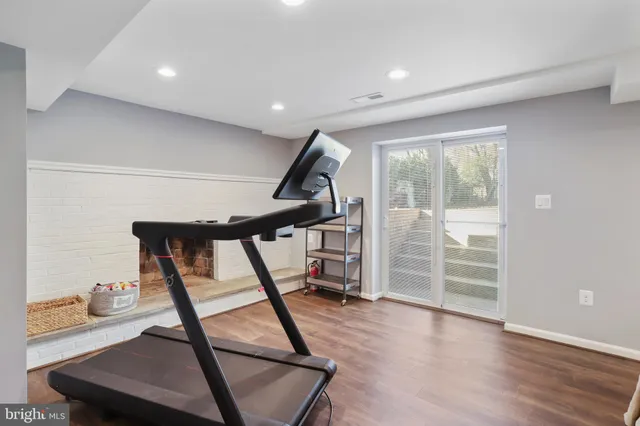 a view of a house with swimming pool and a yard