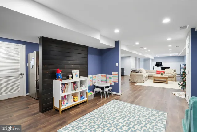 a view of a roof deck with table and chairs floor to ceiling window with wooden floor