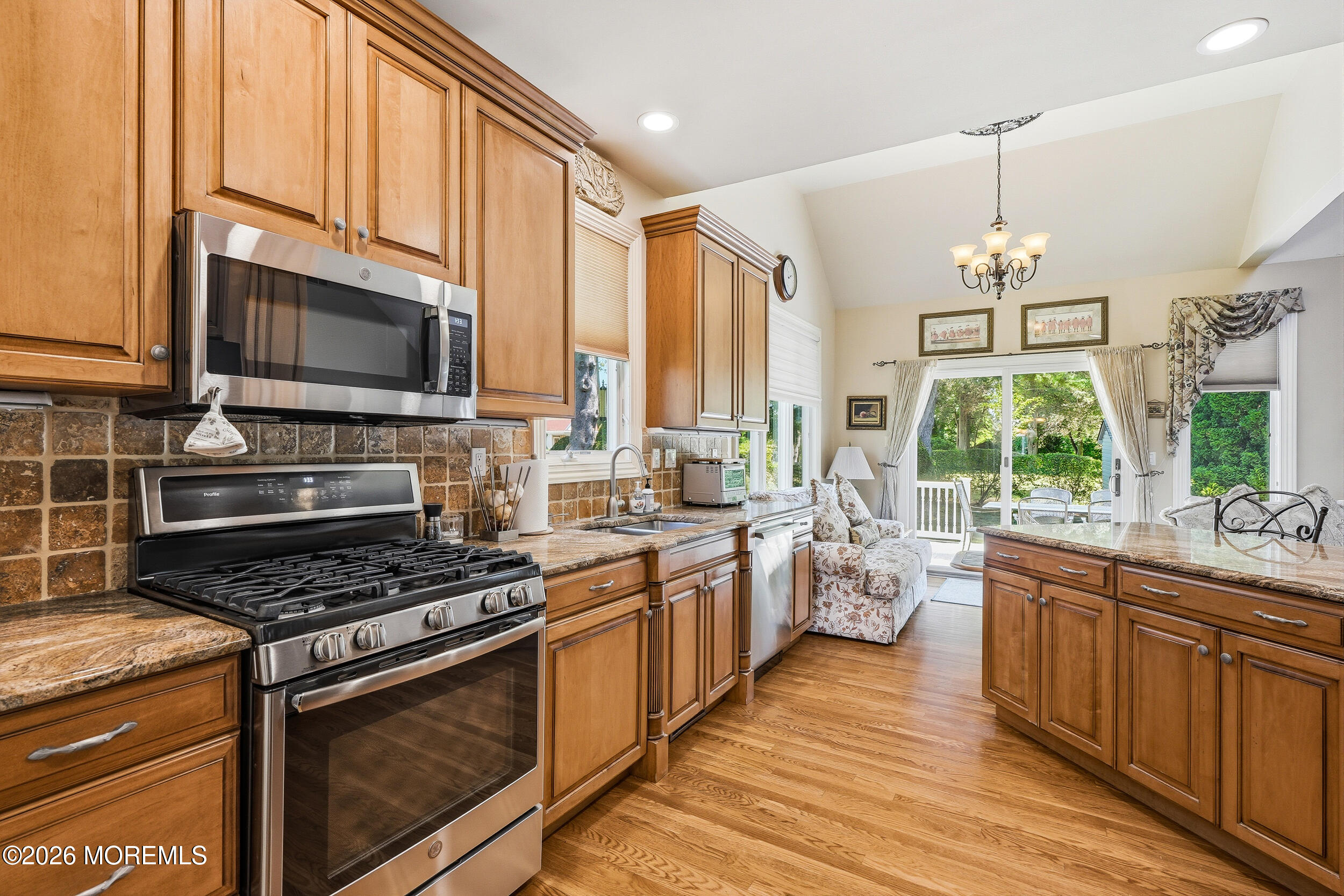 478 Rickey Lane Long Branch, NJ 07740 - Photo 31 of 64 a kitchen with stainless steel appliances a stove sink and microwave