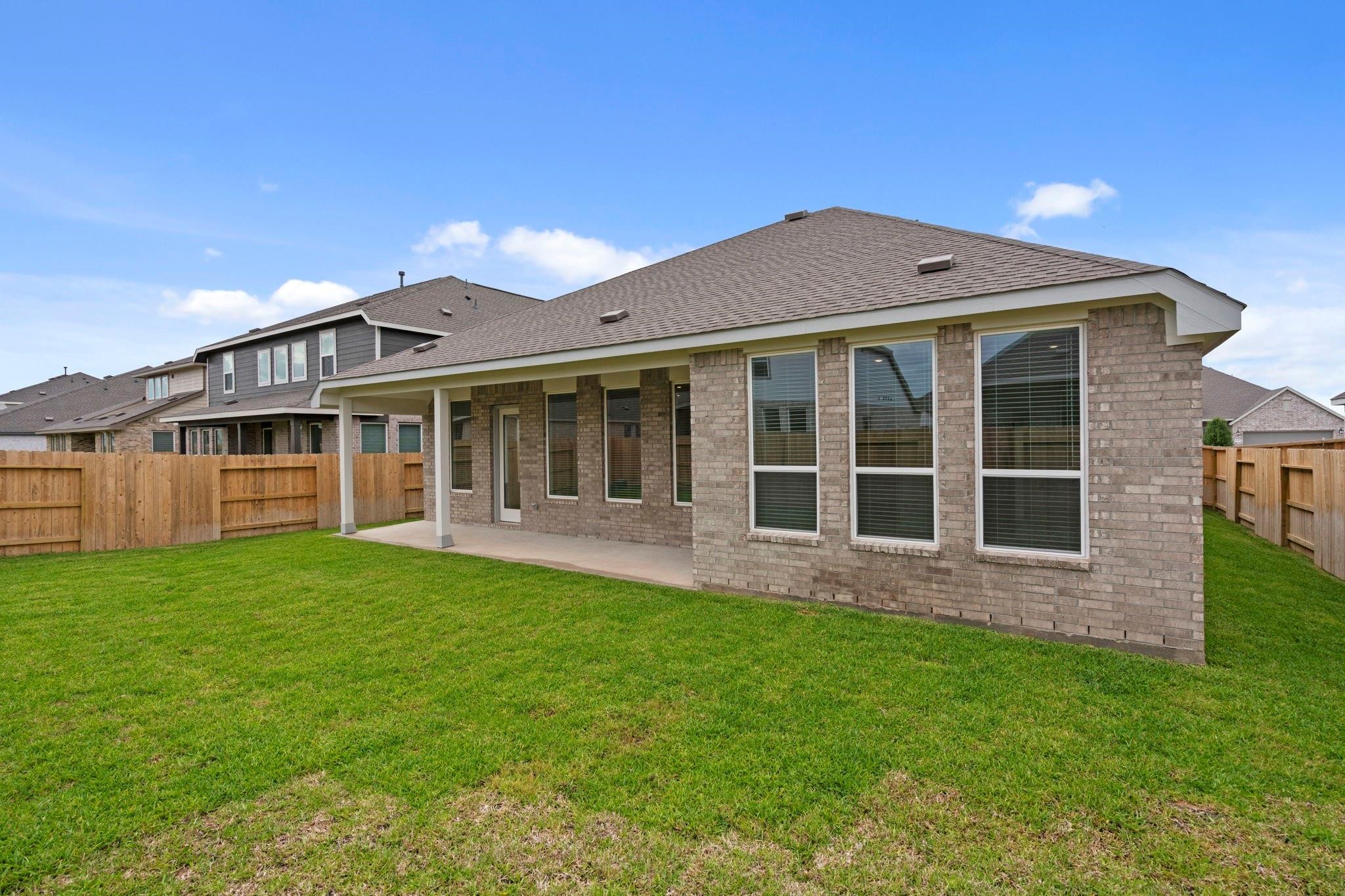 2716 Pine Bluff Drive Rosenberg, TX 77469 - Photo 32 of 32 a view of a house with a yard