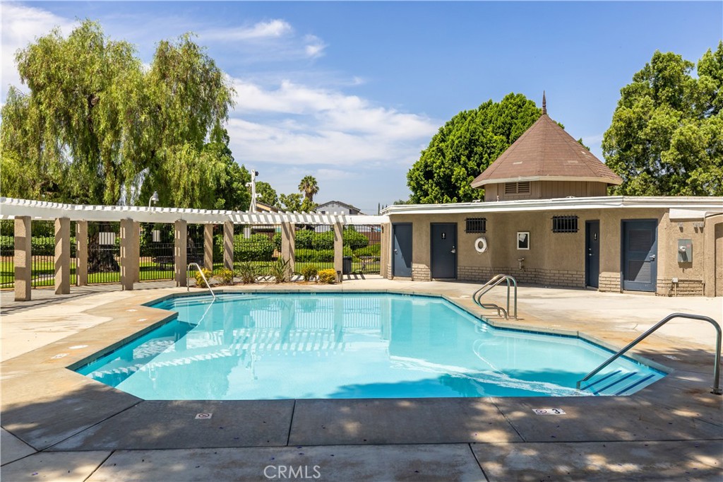 3004 Cardamon Street Rialto, CA 92376 - Photo 53 of 60 Community Pool & Clubhouse Located Just Beyond Backyard Lawn