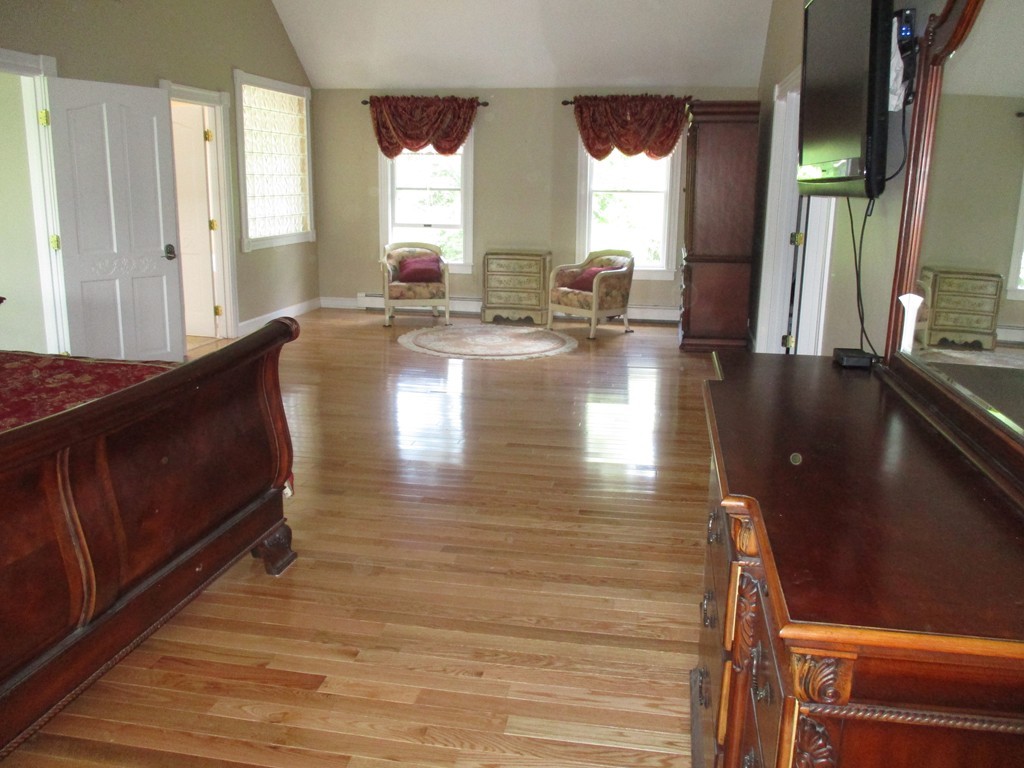 245 Haggetts Pond Road Andover, MA 01810 - Photo 17 of 30 a lobby with furniture and floor to ceiling window