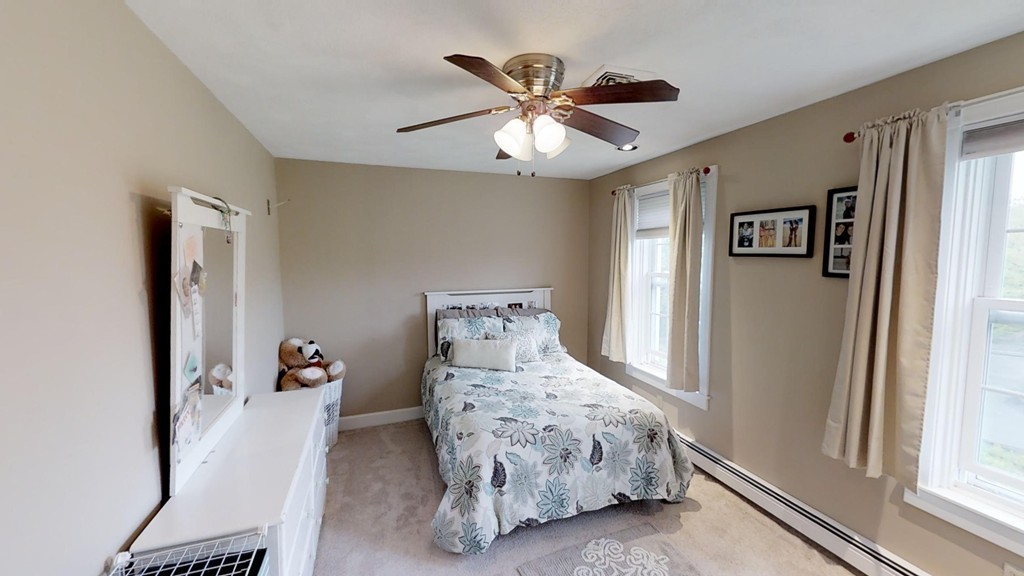 245 Haggetts Pond Road Andover, MA 01810 - Photo 19 of 30 a bedroom with a bed and a window