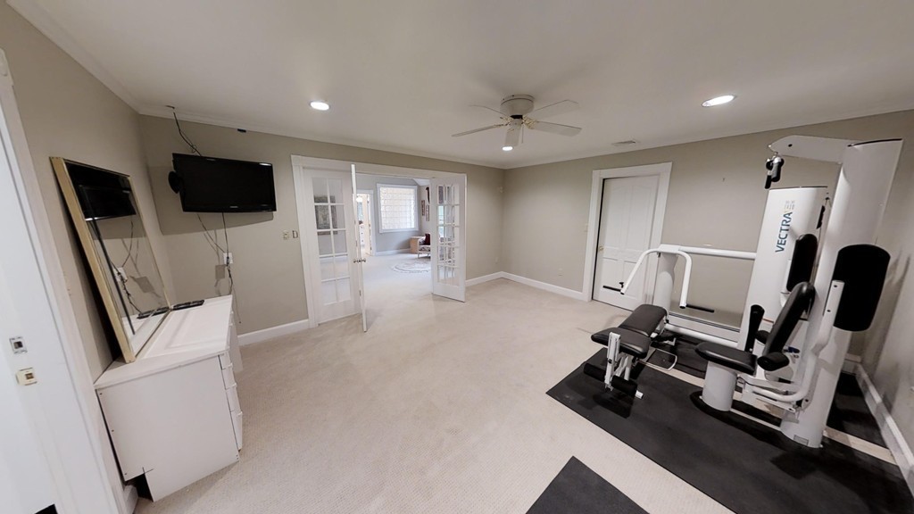 245 Haggetts Pond Road Andover, MA 01810 - Photo 24 of 30 a view of a room with gym equipment