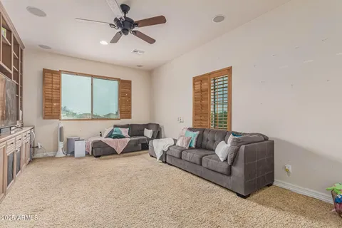 a room with gym equipment and a window