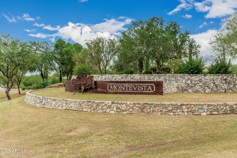 a view of a golf course with a big yard