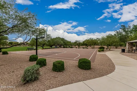 a view of a street with a building in the background