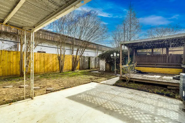 a view of swimming pool with outdoor seating