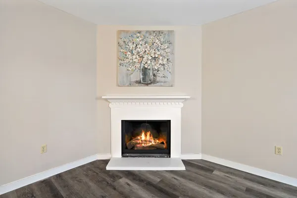 a living room with a fireplace