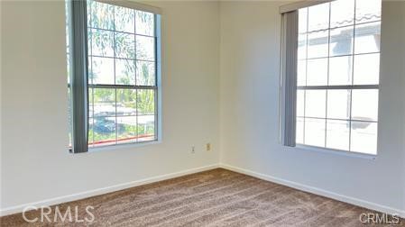 375 Central, Unit 124 Riverside, CA 92507 - Photo 11 of 31 an empty room with wooden floor