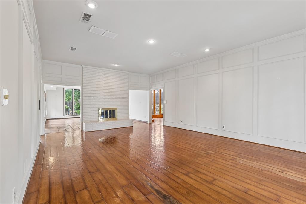4 Eastshore Road Heath, TX 75032 - Photo 2 of 37 a view of a livingroom with wooden floor